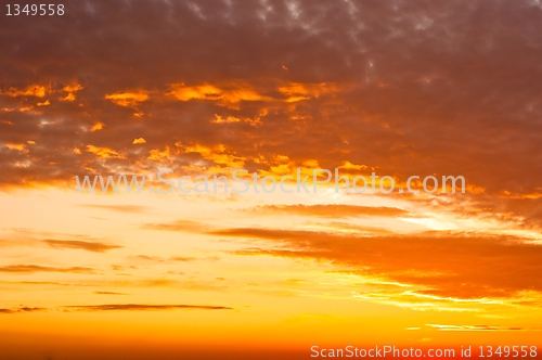 Image of Orange sunset with clouds