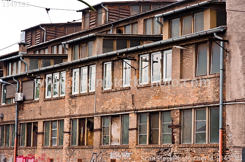 Image of Abandoned industrial building with brick wall