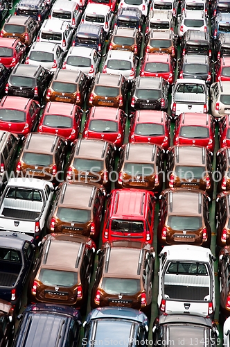 Image of Many cars transported  to their selling location
