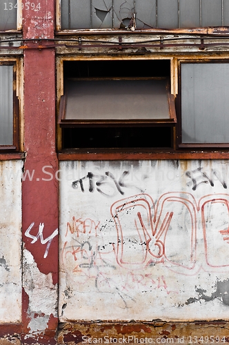 Image of Part of an industrial building with opened window