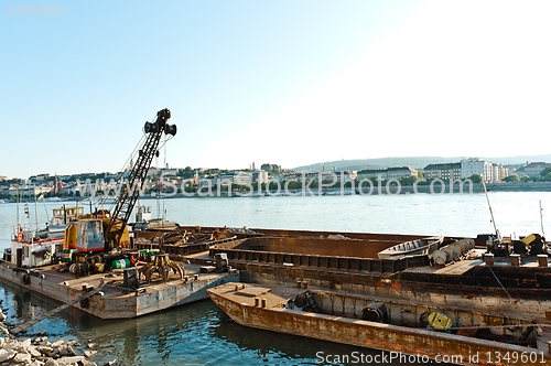 Image of Old construction boats on the river