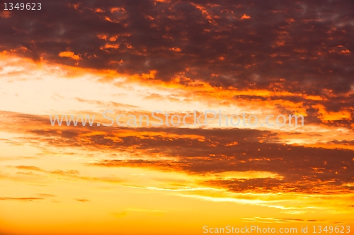 Image of Orange sunset with clouds