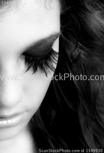 Image of Black and white photo of a girl with extreme makeup