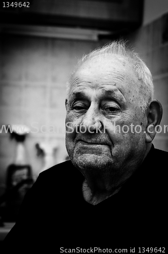 Image of Portrait of an old man looking tired