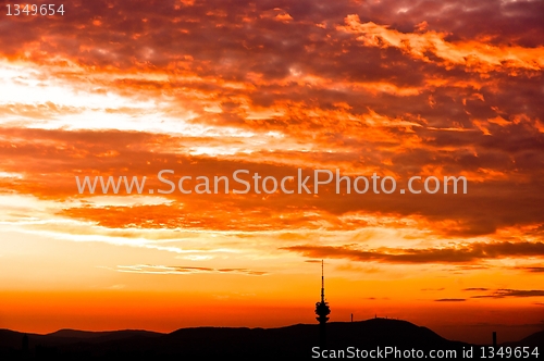 Image of Silhouettes of mountains and sky with cliuds