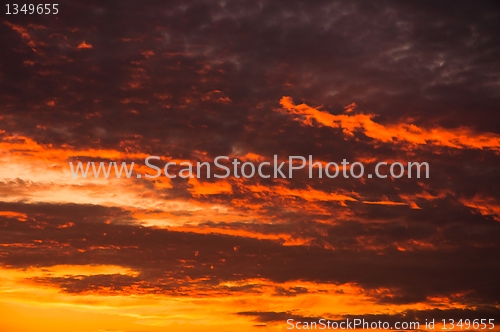 Image of Red sky with several storm clouds