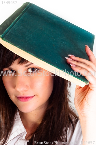 Image of Young girl and her book against white background