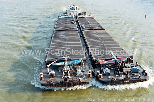 Image of Big oil transporter on water moving fast