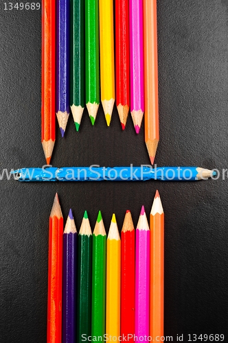 Image of Conceptual photo of some pencils representing a mouth