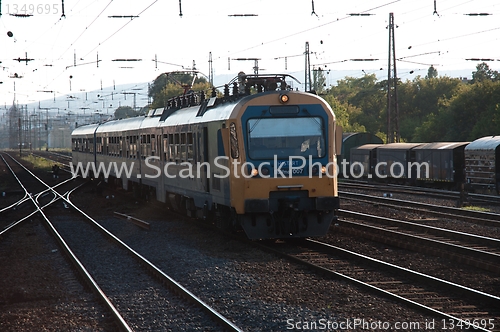 Image of Angle shot of a train coming very fast