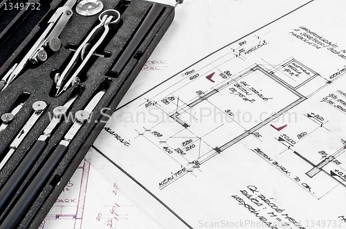 Image of Tools and construction plans as a business background