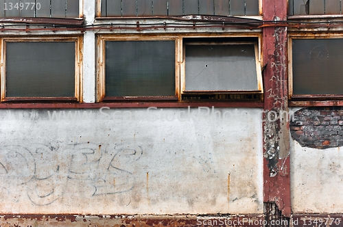 Image of Part of an industrial building with opened window