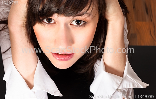 Image of A depressed girl with troubled expression close up