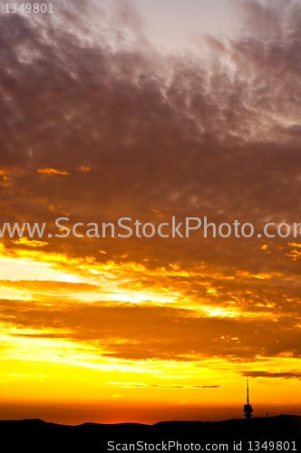 Image of Orange sunset with clouds