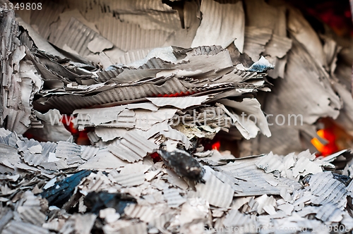 Image of Paper burning in a recycle center