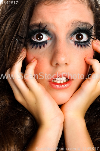 Image of Terrified girl in extreme makeup