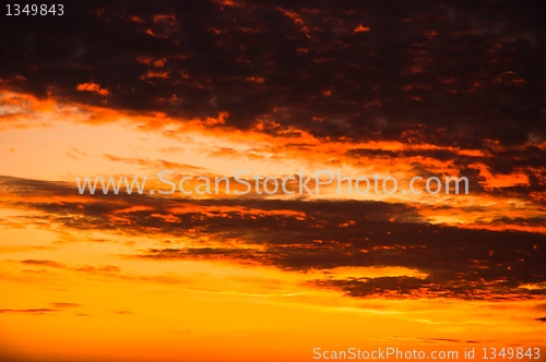 Image of Orange sunset with clouds 