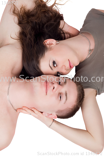 Image of Portrait of the beautiful young couple. Isolated on white