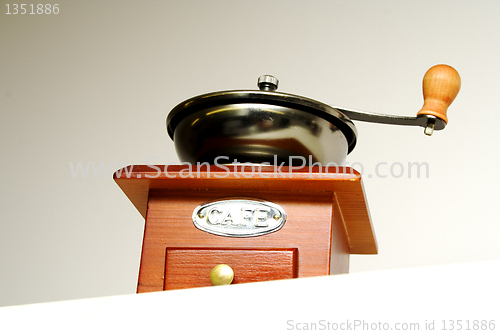 Image of Interesting foto of old fashioned coffee grinder