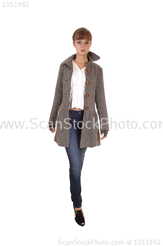 Image of Girl in brown coat.