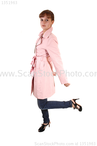 Image of Girl in pink coat.