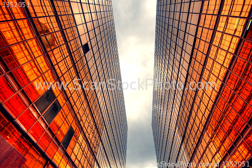 Image of Skyscrapers with clouds reflection 