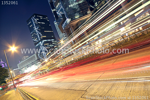 Image of speeding car through the street