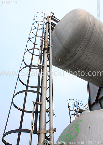 Image of Stainless steel stairway in the tanks of a modern winery 