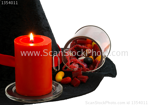 Image of Halloween candies and candle isolated
