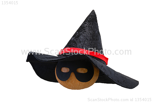 Image of Halloween pumpkin in witch hat and black mask