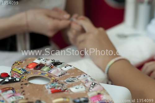 Image of Placing nails. Manicure