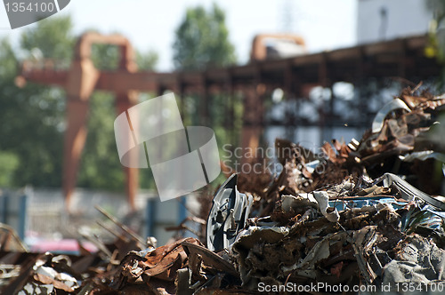 Image of Pile of scrap iron and crane