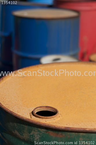 Image of Old colored barrels for oil products