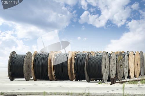 Image of Large rolls of black cables