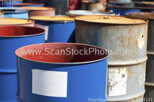 Image of Old colored barrels for oil products