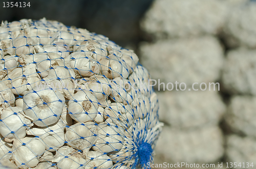 Image of Mesh bag with garlic