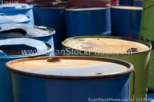 Image of Old colored barrels for oil products