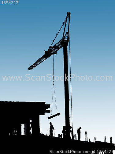 Image of Construction site with crane and workers