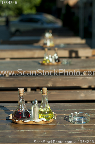 Image of Wooden table in the restaurant and utensils
