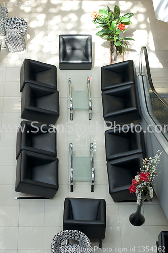 Image of Luxurious black chairs in a bar