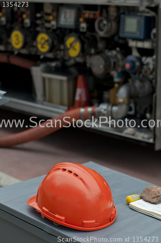 Image of Fuel truck and helmet close up
