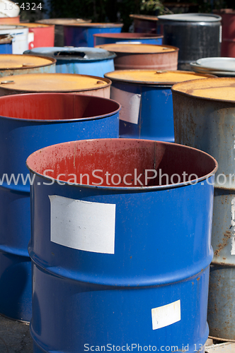 Image of Old colored barrels for oil products