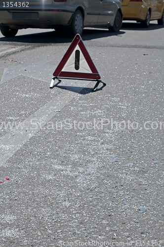 Image of Broken glass from car on a road.