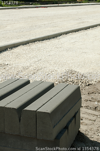 Image of Curb and gravel on the road in repair