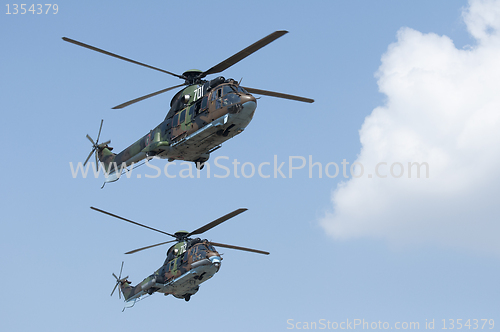 Image of Green military helicopters. Horizontal image