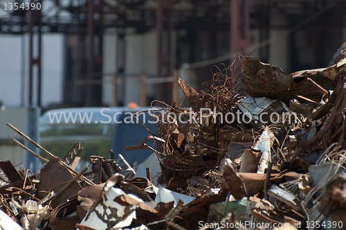Image of Pile of scrap iron and crane
