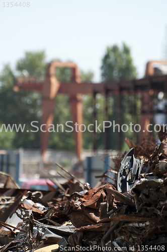 Image of Pile of scrap iron and crane