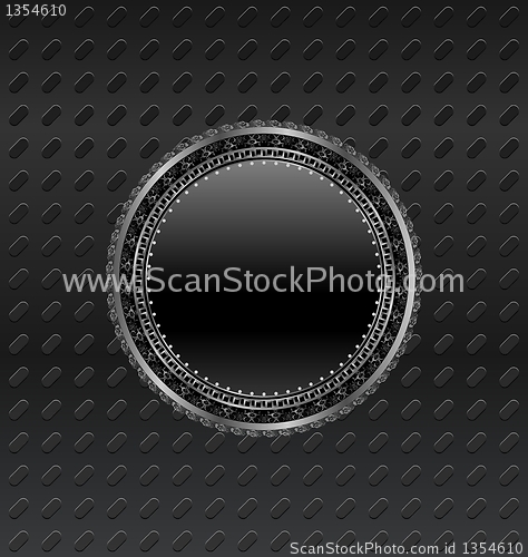 Image of heraldic circle shield on titanium background