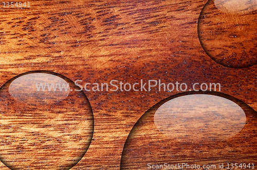 Image of water drop on wood surface