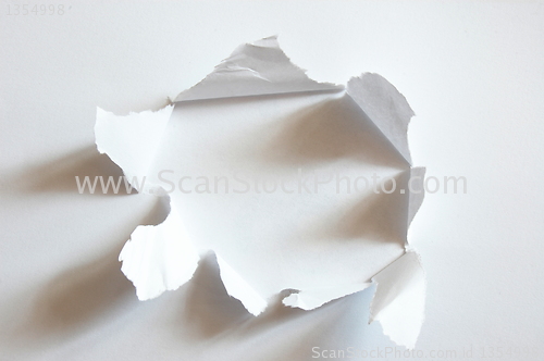 Image of hole in paper